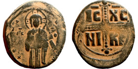 Anonymous Follis attributed to Michael IV(1034-1041). Obverse: +ЄMMA-NOVH Nimbate Christ Antiphonetes standing facing Reverse: Large cross IC-XC / NI-...