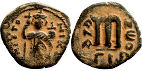 Constans II (641-668) Follis. Obverse: Imperial figure holding cross and globus Reverse: m and inscription
21mm 4,43g

Artificial sand patina