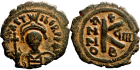 Maurice Tiberius (582-602) Half Follis. Obverse: Helmeted and cuirassed bust facing, holding globus cruciger and shield., Reverse: Large K above cross...