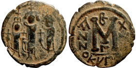 Heraclius, Martina and Heraclius Constantine (610-641). Follis. Obverse: From left, Martina, Heraclius, heraclius Constantine Reverse: Large M; cross ...