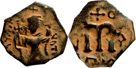 Constans II (641-668) Follis. Obverse: Imperial figure holding cross and globus Reverse: m and inscription
20mm 1,25g

Artificial sand patina