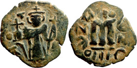 Constans II (641-668) Follis. Obverse: Imperial figure holding cross and globus Reverse: m and inscription
23mm 3,50g0