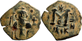 Constans II (641-668) Follis. Obverse: Imperial figure holding cross and globus Reverse: m and inscription
23mm 3,98g0