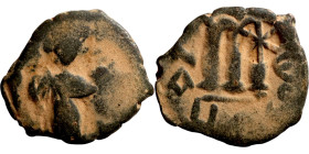 Constans II (641-668) Follis. Obverse: Imperial figure holding cross and globus Reverse: m and inscription
19mm 4,26g

Artificial sand patina