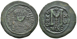 IMPERIO BIZANTINO. JUSTINIANO I. Follis. Nicomedia. A/ R/ Año de reinado 16, oficina B, marca de ceca NIKO, encima cruz. AE 17,81 g. 37,4 mm. SBB-201....