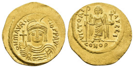 IMPERIO BIZANTINO. MAURICIO TIBERIO. Sólido. Constantinopolis. A/ Busto frontal con corona y globo crucífero. R/ Ángel frontal con bastón rematado en ...