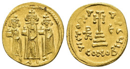 IMPERIO BIZANTINO. HERACLIO, HERACLIO CONSTANTINO Y HERACLONAS. Sólido. Constantinopolis. A/ Los tres emperadores de pie, de frente, con corona y glob...