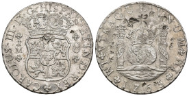 CARLOS III. 8 reales. 1765. Lima. JM. Punto sobre las L de ambas marcas de ceca. AR 27,04 g. 38,9 mm. VI-876; AC-1025. Resellos orientales. R.B.O. EBC...