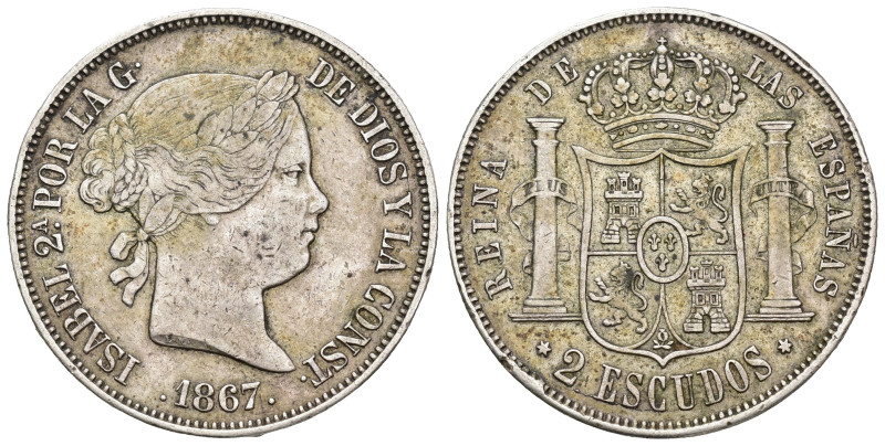 ISABEL II. 2 escudos. 1867. Madrid. AR 26,03 g. 37 mm. VI-538; AC-647. Golpecito...