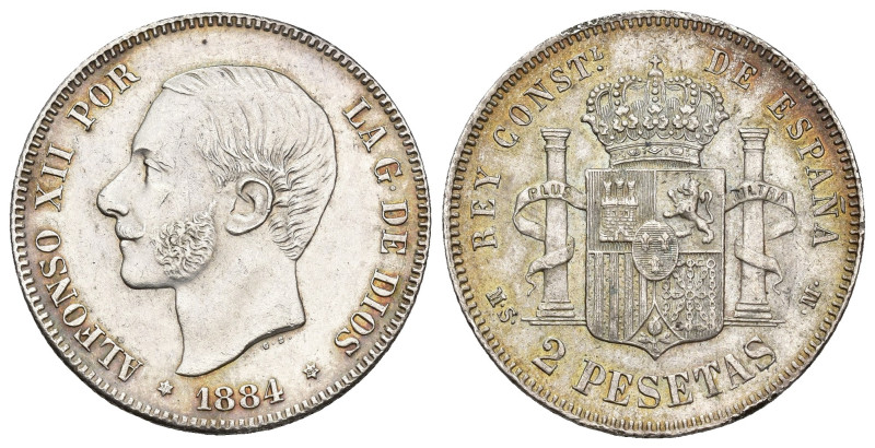 ALFONSO XII. 2 pesetas. 1884. AR 9,96 g. 27,1 mm. VII-74; AC-34. Pequeñas marcas...