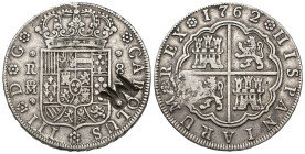 MONEDA EXTRANJERA. MOZAMBIQUE. Resello MR sobre 8 reales 1762. Madrid. JP. AR 26,66 g. 39,2 mm. MBC. Rara.