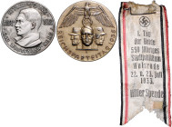 Medaillen und Abzeichen. 
Lot von 3 Stücken: Versilberter Bronzeanstecker, Winterhilfe 1933/134 Hitlers Dank Gau Westfalen-Nord, rückseitig Herstelle...