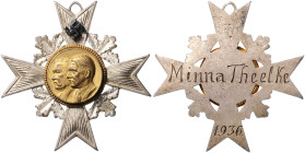 Medaillen und Abzeichen. 
Ordensstern 1936 graviert mit Eichenlaub und aufgesetzter Plakette mit 'Hitler/Hindenburg' und Hakenkreuz, mit rückseitiger...