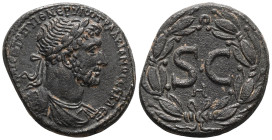 Hadrian Syria, AE28 Antioch 117-138 AD. AVT KAIC Θ TP Π YI Θ NEP YIW TP ADPIANOC CEBAC, laureate, draped and cuirassed bust right / large SC, small H ...