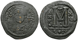 ByzantineJustinian I, 527-565. Follis (Bronze), Constantinopolis, RY 16 = 542/3. D N IVSTINIANVS P P AVI Helmeted and cuirassed bust of Justinian I fa...