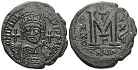 Justinian I, AE, Follis (Bronze) Theoupolis (Antioch). 527-565 AD.Obv: D N IVS[TINIAN]VS P P AV[G], Frontal bust of Justinian I with plumed helmet, di...
