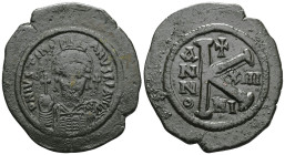 ByzantineJustinian I, 527-565. Half Follis (Bronze), Nicomedia, 541-542. D N IVSTINIANVS P P AVI Helmeted and cuirassed bust of Justinian I facing, ho...