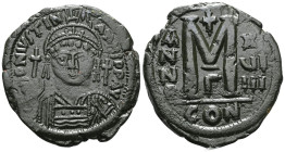 Byzantine coinsJustinian I (527-565) AE follis (Bronze) ConstantinopleObv: DNIVSTINI ANVSPPAVC Facing bust of Justinian I cuirassed in plumed helmet, ...