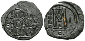 ByzantineJustin II, with Sophia, 565-578. Follis . Constantinople. Nimbate figures of Justin and Sophia seated facing on double throne, holding globus...
