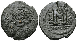 Justinian I, (A.D. 527-565), AE follis, Antioch as Theoupolis mint, issued 560-561, officina G, obv. Justinian bust facing, rev. M, X/X/IIII to right,...