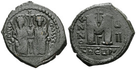 Justin II, with Sophia (565-578) AE follis (Bronze) Theoupolis (Antioch) mint Dated RY 7 (571/572).Obv: Justin and Sophia seated facing on double thro...