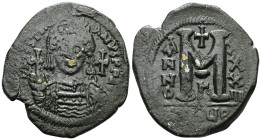 Justinian I, (A.D. 527-565), AE follis, Antioch as Theoupolis mint, issued 560-561, officina G, obv. Justinian bust facing, rev. M, X/X/IIII to right,...