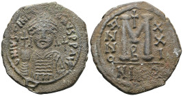 Byzantine coinsJustinian I (527-565) AE Follis (Bronze) Nicomedia.Obv: D N IVSTINIANVS P P AVG, Helmeted and cuirassed facing bust, holding globus cru...