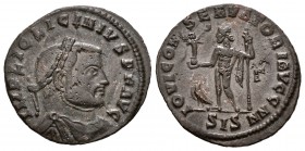 Licinio I. Follis. 313-315 d.C. Siscia. (Spink-15205). (Ric-222a). Rev.: IOVI CONSERVATORI, en exergo SIS. Ae. 3,52 g. Marcas en anverso. MBC+/EBC-. E...