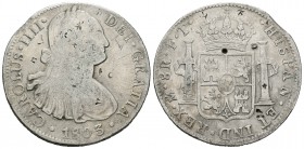 Carlos IV (1788-1808). 8 reales. 1803. México. FT. (Cal-699). Ag. 26,45 g. Resellos orientales. BC+. Est...55,00.