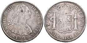 Carlos IV (1788-1808). 8 reales. 1798. Potosí. PP. (Cal-721). Ag. 26,65 g. Punzón en reverso. MBC. Est...60,00.