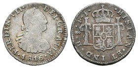 Fernando VII (1808-1833). 1/2 real. 1816. Santiago. FJ. (Cal-1395). Ag. 1,63 g. Escasa. MBC-. Est...50,00.