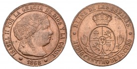 Isabel II (1833-1868). 1/2 céntimo de escudo. 1868. Sevilla. OM. (Cal-680). Ae. 1,26 g. Brillo original. SC-. Est...50,00.
