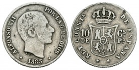 Alfonso XII (1874-1885). 10 centavos. 1883. Manila. (Cal-96). Ag. 2,49 g. Golpes de punzón en anverso. BC+. Est...25,00.