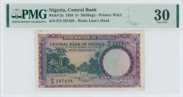 NIGERIA: 5 Shillings (15.9.1958) in lilac and blue-green. River scene and palm trees on face. S/N: "P/2 197428". WMK: Lion head. Printed by W&S. Insid...