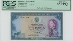 RHODESIA: 5 Pounds (10.11.1964) in blue-green on multicolor unpt. Blue portrait of Queen Elizabeth II at right, coat of arms at upper center and antel...
