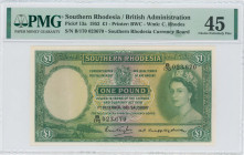 SOUTHERN RHODESIA: 1 Pound (1.12.1952) in green and multicolor. Portrait of Queen Elizabeth II at right on face. S/N: "B/170 023670". WMK: C Rhodes. P...