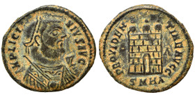 Licinius I, 308-324. Ae (bronze, 3.08 g, 19 mm), Heraclea. IMP LICINIVS AVG Laureate bust right, wearing imperial mantle, holding globe, scepter, and ...