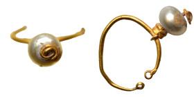 Ancient to Medieval. Gold jewelry with stone (0.35 g). Sold as seen.