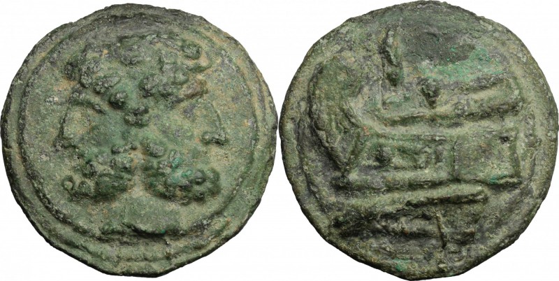 Janus/Prow to left semilibral series. AE Cast As, c. 217-215. D/ Laureate head o...