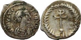 Justinian I (527-565).. AR Quarter Siliqua, Ravenna mint. DOC 341 var? Ranieri 365.   0.38 g.  10 mm.