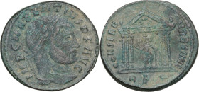 Maxentius (306-312). AE Follis, Rome mint, 310-311 AD. Obv. IMP C MAXENTIVS P F AVG. Laureate head right. Rev. CONSERV VRB SVAE. Roma seated facing, h...