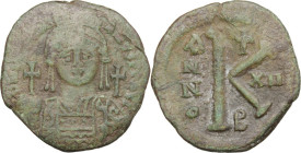 Justinian I (527-565). AE Half Follis, Constantinople mint. Obv. DN IVSTINIANVS PP AVG. Helmeted and cuirassed bust facing, holding globus cruciger an...