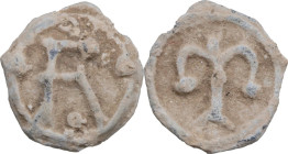 Leads from Ancient and Medieval World. PB Tessera, ancient world. D/ Large R; four pellets around. R/ Large T or stylized lily flower. PB. 2.15 g. 14....