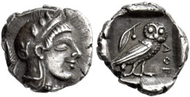 Attica, Athens 

Obol circa 450-430, AR 10 mm, 0.71 g. Head of Athena r., wearing crested Attic helmet with three olive leaves over visor and spiral...