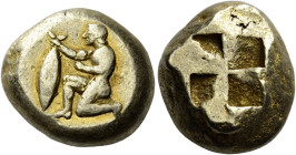 Mysia, Cyzicus 

Stater circa 550-450, EL 18 mm, 16.05 g. Nude male kneeling l., holding in his extended r. hand a tunny fish by the tail. Rev. Quad...