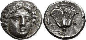 Rhodes 

Tetradrachm circa 404-385, AR 23 mm, 14.55 g. Head of Helios facing, slightly r. Rev. [PO]ΔION Rose with bud to l.; in l. field, T and in r...