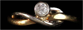 Schmuck und Accessoires aus Gold

Fingerringe

Damenring Gelbgold/Weißgold 585/1000 mit kleinem Diamant. Ringgröße 16. 2,14 g