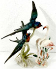 Varia

Porzellan

2 Porzellanfiguren um 1980. "Schwalben im Flug" und "Flamingos". Hutschenreuther, beide nach Modellen von Hans Achtziger (1918-2...