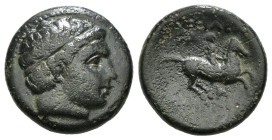 KINGS OF MACEDON. Philip II (359-336 BC). Ae Unit. Uncertain mint in Macedon.
Obv: Diademed head of Apollo right.
Rev: ΦΙΛΙΠΠΟΥ.
Naked youth on horse ...