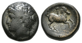 KINGS OF MACEDON. Philip II (359-336 BC). Ae Unit. Uncertain mint in Macedon.
Obv: Male head left, wearing tainia.
Rev: ΦΙΛΙΠΠΟΥ.
Youth on horseback r...